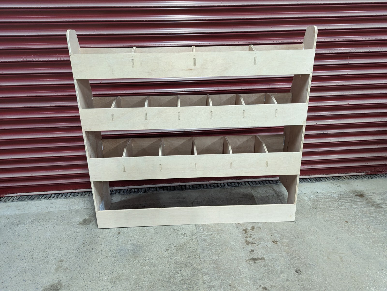 RS VW Caddy SWB van racking and shelving organizer on off side, designed for tool storage and commercial vehicle organization.