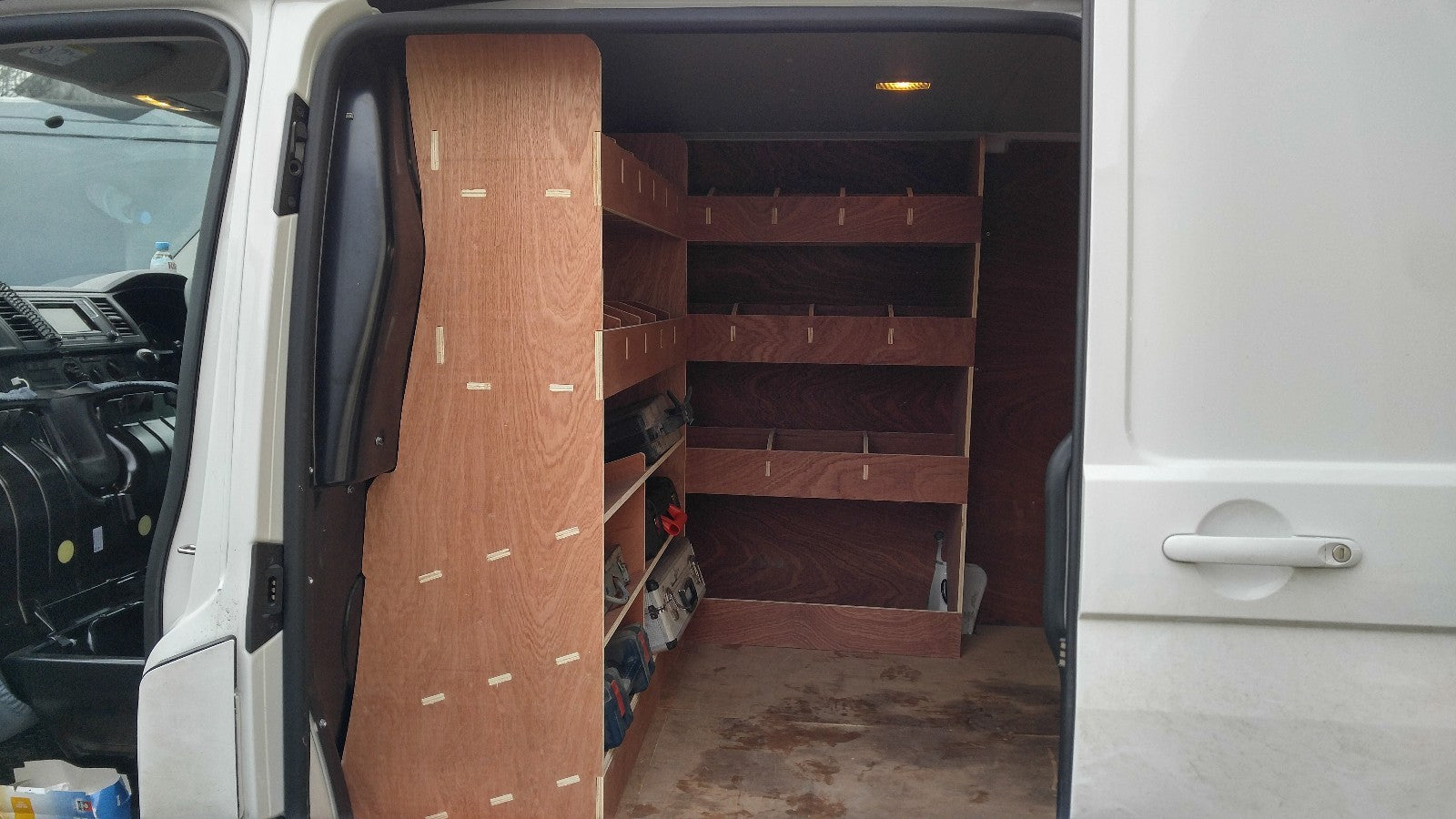 RS VW T5 T6 SWB triple van racking with plywood shelving for commercial vehicle storage in a van or pickup.