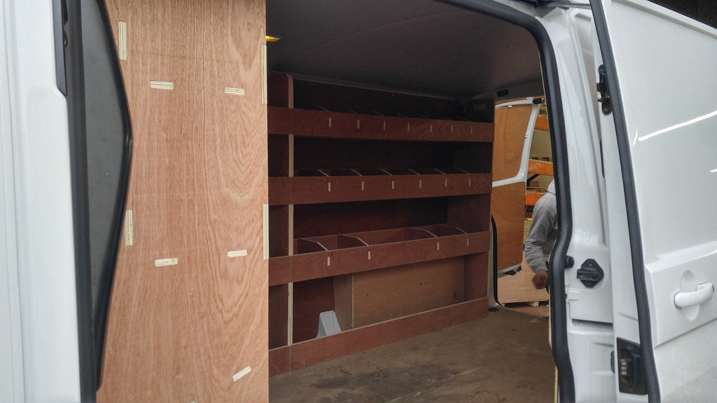 RS VW T5 T6 SWB triple van racking with plywood shelving for storage in commercial vehicle van or pickup.
