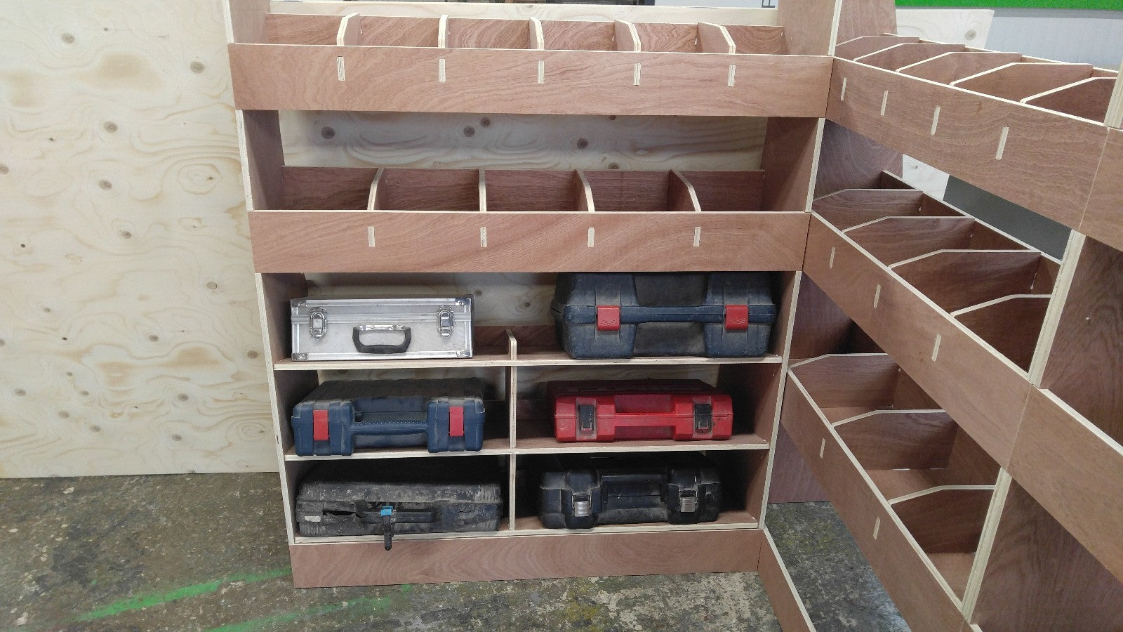 RS VW T5 T6 SWB triple van racking with plywood shelving for storage in commercial van interior.