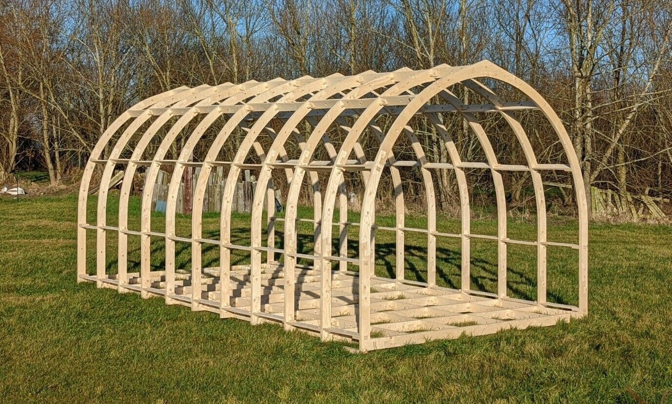 Shropshire CNC glamping pod frame kit, 4.0m wide, modular building structure with wooden beams and metal connectors.
