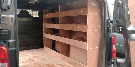 Toyota Proace LWB van interior with plywood shelving and racking for efficient storage and organization.