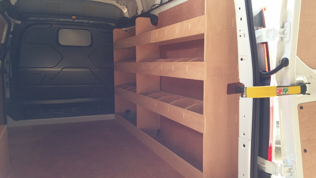 Ford Transit Custom LWB double van with plywood shelving racks for organized storage and vehicle parts accessories.