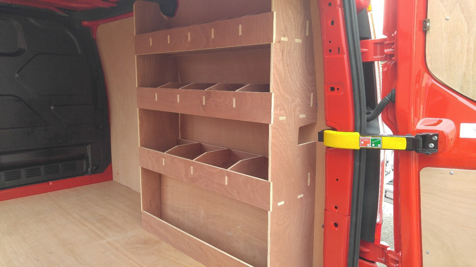 Ford Transit Custom SWB 2012-2023 van shelving and racking system for tool storage in commercial vehicle interior.