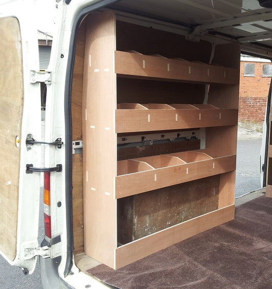 Ford Transit MK7 SWB plywood racking and shelving system installed in van for storage and organization of tools and supplies