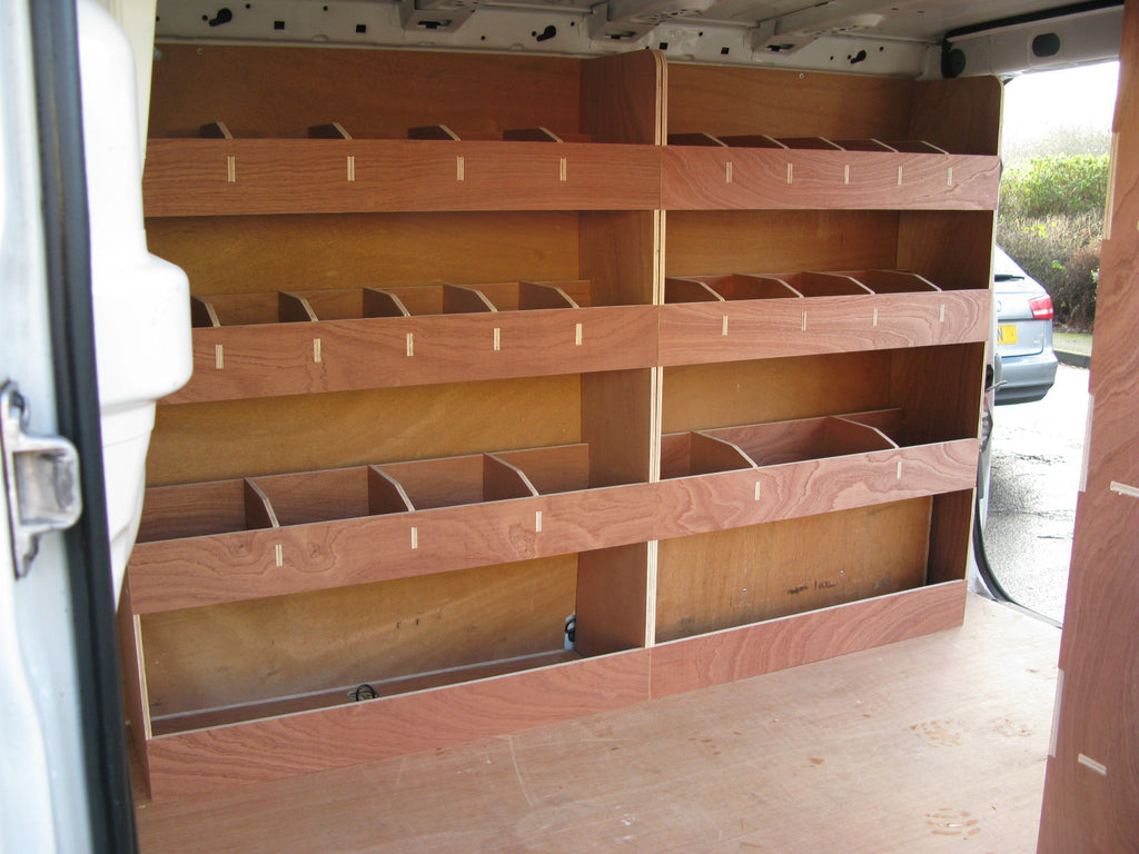 Vauxhall Vivaro SWB Van 2002-2014 interior with plywood shelving and storage racking for tools and equipment organization.