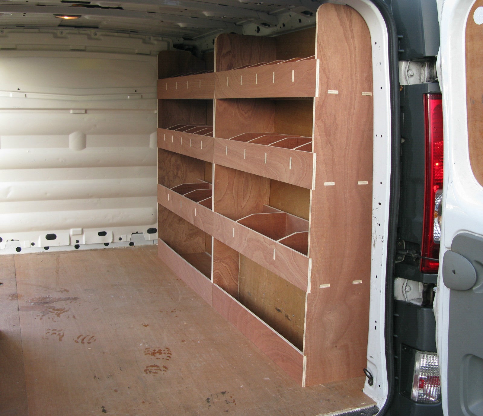 Vauxhall Vivaro SWB 2002-2014 double rear unit plywood van part, designed for commercial vehicle storage and organization.