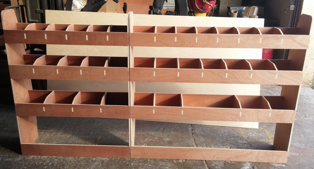 VW T6 Transporter LWB van racking with plywood shelving for storage and organization in commercial vehicle interior.