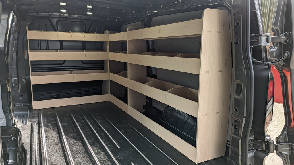VW T7 Transporter LWB triple van shelving unit, installed inside the cargo area, for organized commercial vehicle storage.