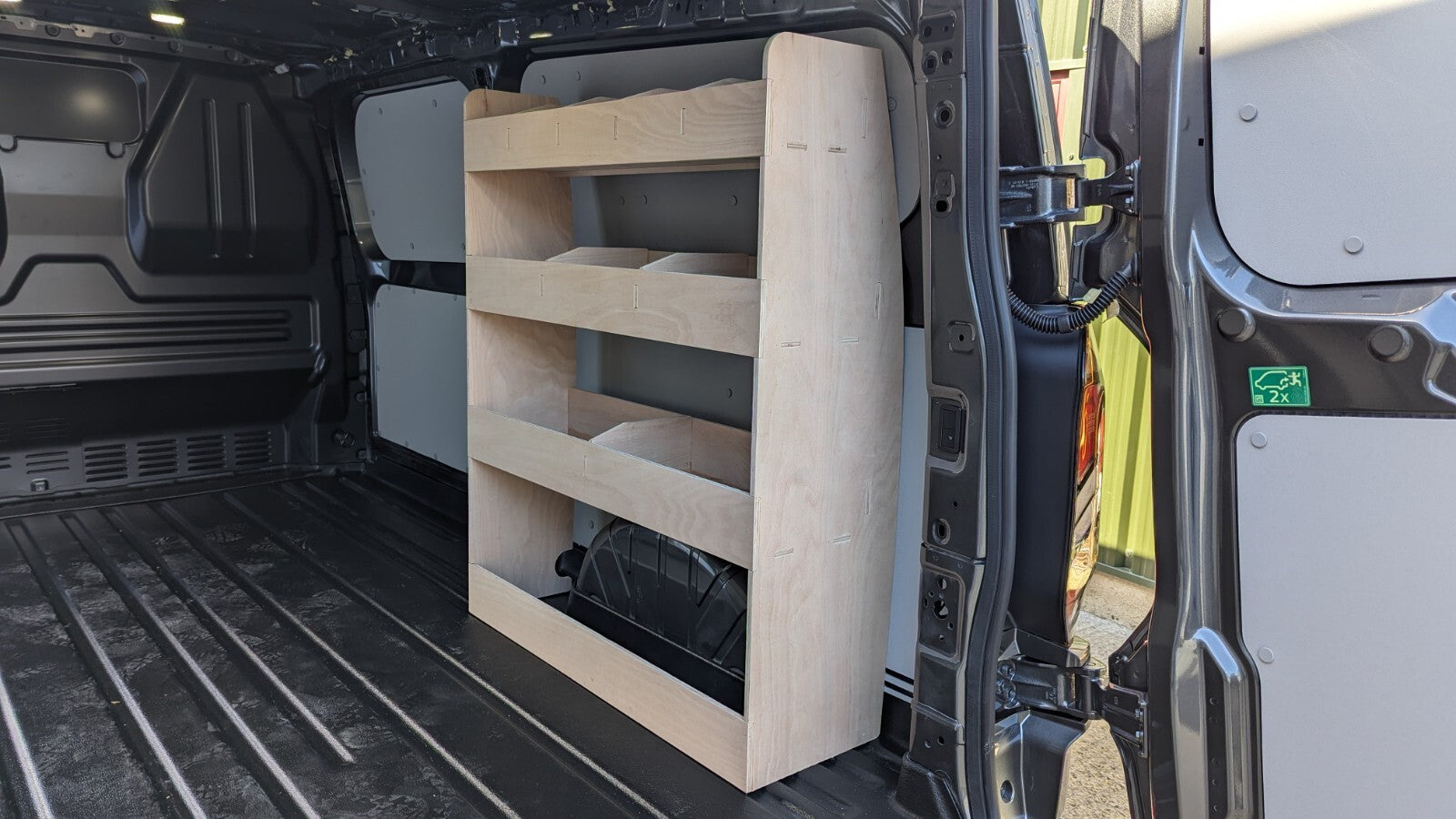 VW Transporter T7 SWB van shelving tool organiser with multiple compartments for vehicle storage and organization.